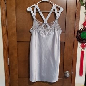 Net and embroidered neckline, double cross back straps slip dress never worn.